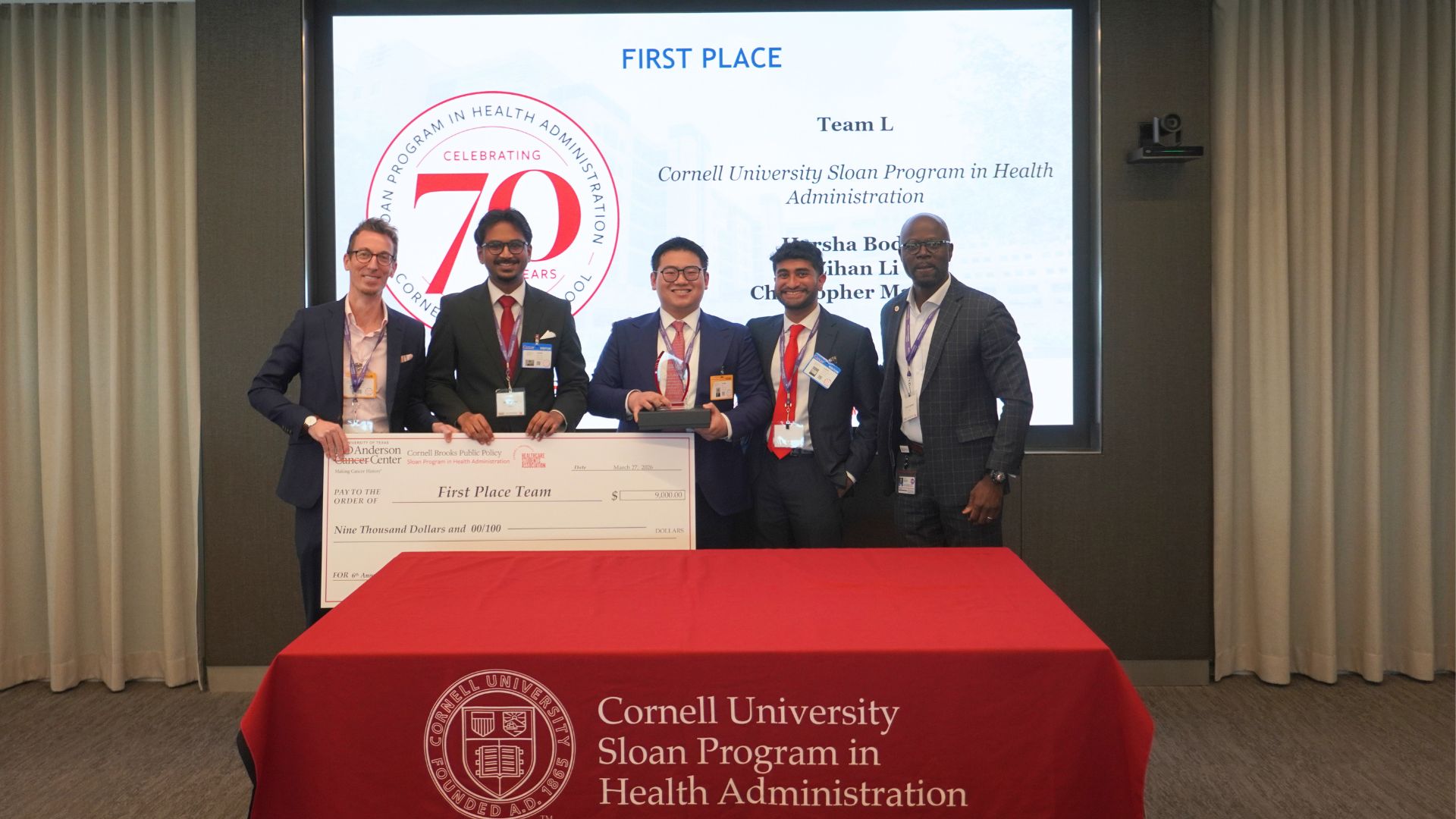 Sloan MHA Faculty Director Professor Michael Richards, team members Harsha Boddu MHA ’27, Tom Li MHA ’27, and Christopher Mathew MHA ’27, and Prince Ampomah, Associate Vice President in the Office of the Chief Physician Executive at MD Anderson Cancer Center, celebrate the Sloan MHA team’s first-place finish at the national health care case competition.