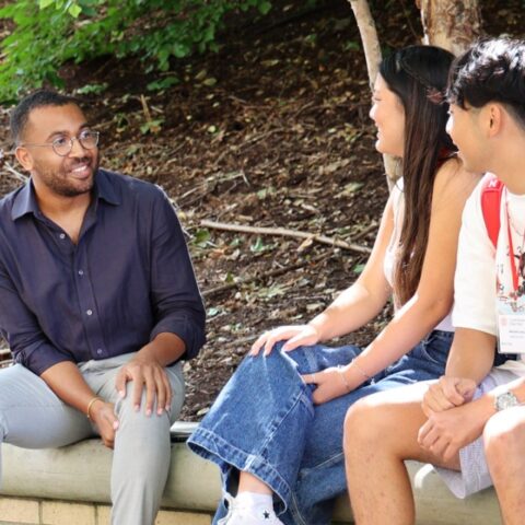 Natalie Kimbrough/Cornell University Assistant Professor of Public Policy William Lodge (left), chats with mentees during a Brooks School orientation session.