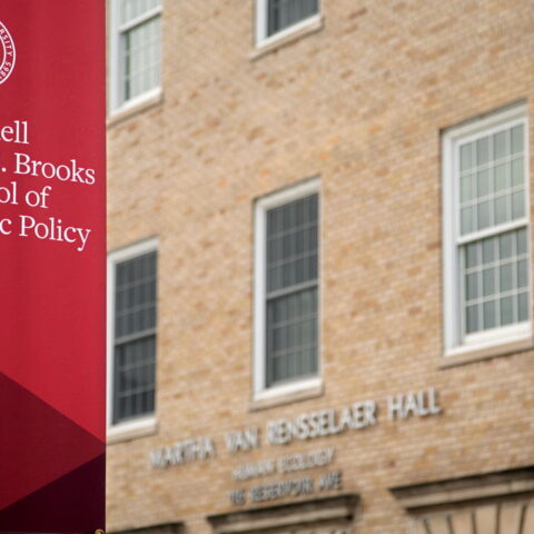 Red Brooks Banner outside of Cornell Building