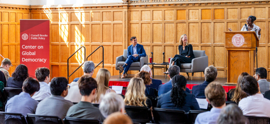 CGD event with three panelists on stage