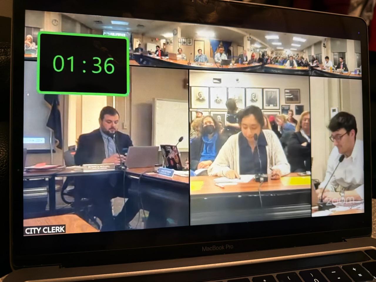 Screen view of two students presenting Legislative testimony