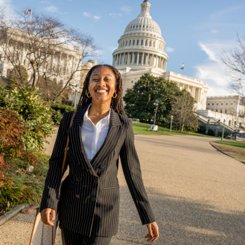 Student walking in front of the Capitol Building in D.C.