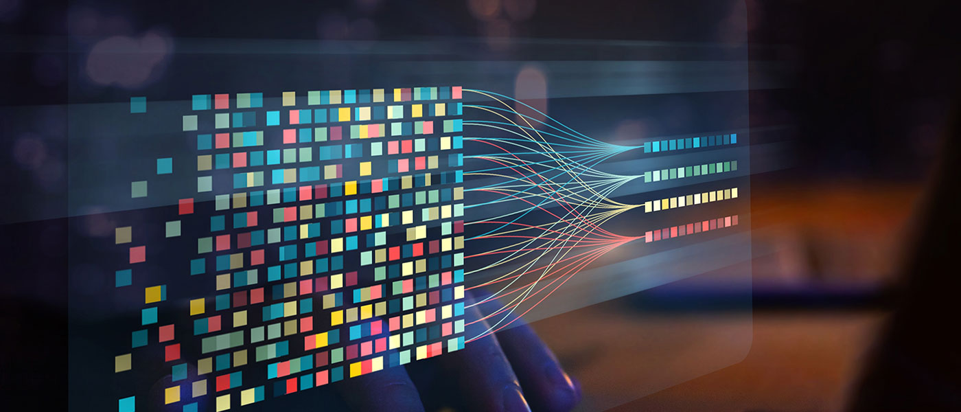 Blue, yellow, and red dots showing data visualization over computer screen