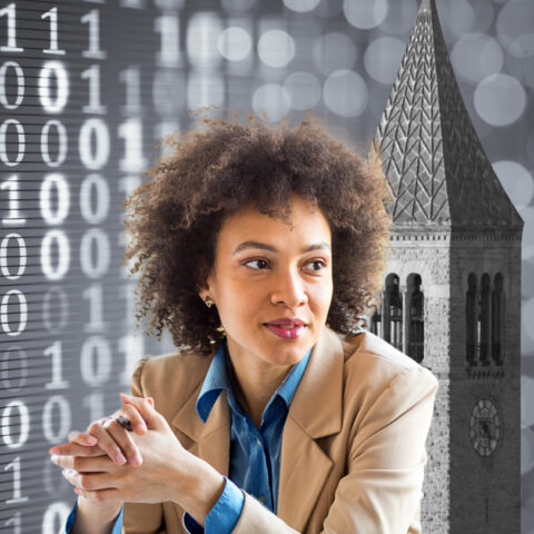 Woman in suit jacket sitting and clasping her hands, black and white background of computer data overlapped with McGraw Tower