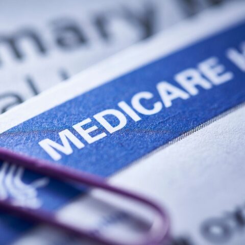 Medicare paperwork with paper clip