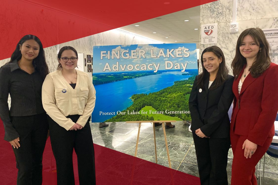 Students presenting in front of a sign that says Finger Lakes Advocacy Day