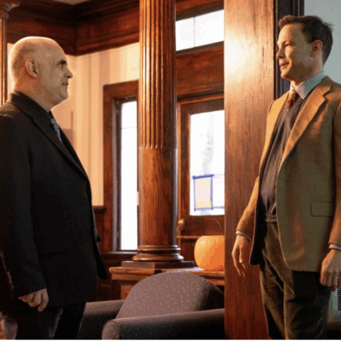 Thomas O'Toole, executive director of public affairs programming at the Brooks School, meets with student veteran U.S. Army Maj. Jess Warren in the Veterans House at 625 University Ave.