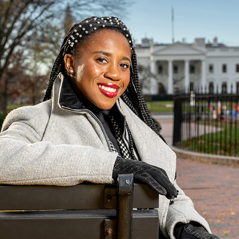 Shelby Williams sitting in front of White House in Washington D.C.