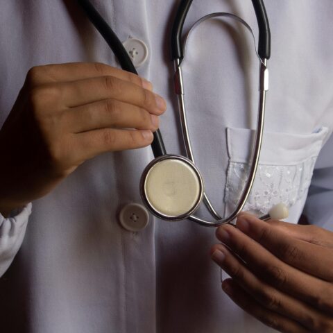 Doctor holding stethoscope