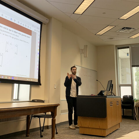 Ari Decter-Frain, Brooks PhD student, practices his PAA conference presentation