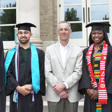 Siliciano and four graduates on the steps Bailey Hall